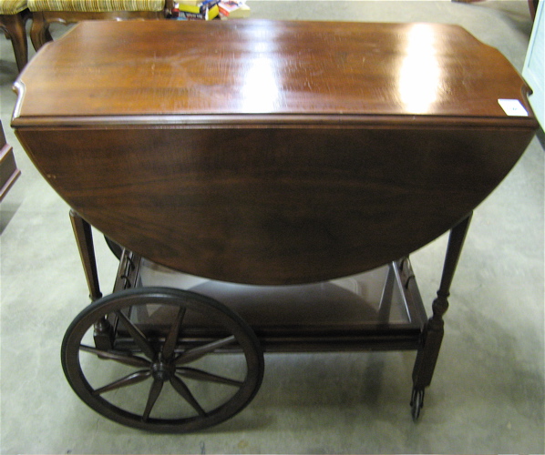 Appraisal: WALNUT DROP-LEAF SERVING CART American th century the rectangular -tier