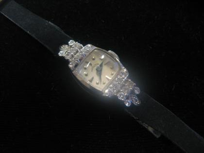 Appraisal: karat white gold and petite circular cut diamond Lady Hamilton