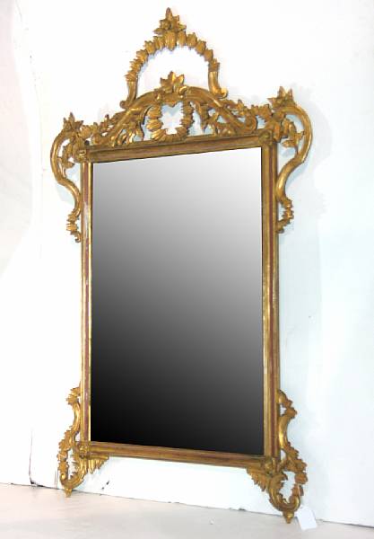 Appraisal: An Italian Rococo style giltwood mirror early th century height