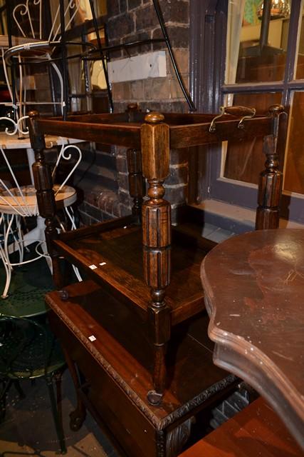 Appraisal: A TWO TIER JACOBEAN STYLE OAK AUTO TROLLEY A TWO