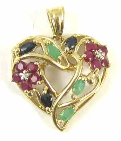 Appraisal: EMERALD RUBY AND SAPPHIRE PENDANT the k yellow gold heart