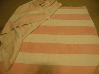 Appraisal: A DURHAM QUILT in candy pink and white stripes reversing