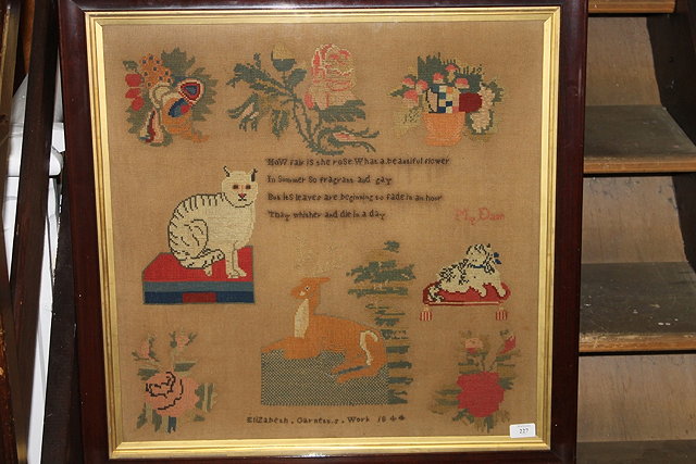 Appraisal: A th Century sampler showing a poem surrounded by flowers