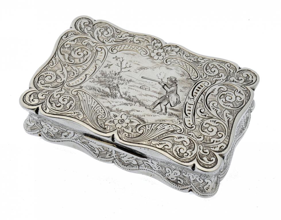 Appraisal: A VICTORIAN SILVER SNUFF BOX the lid engraved with a