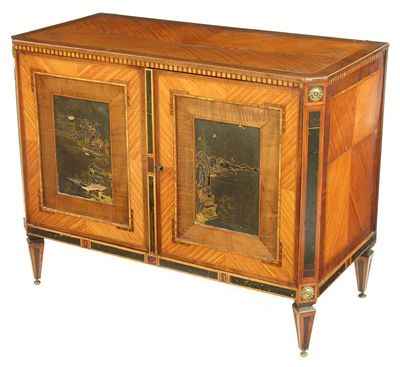 Appraisal: A Dutch tulipwood and harewood commode with canted corners stringing