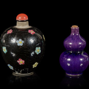 Appraisal: Two Porcelain Snuff Bottles the first a black ground example