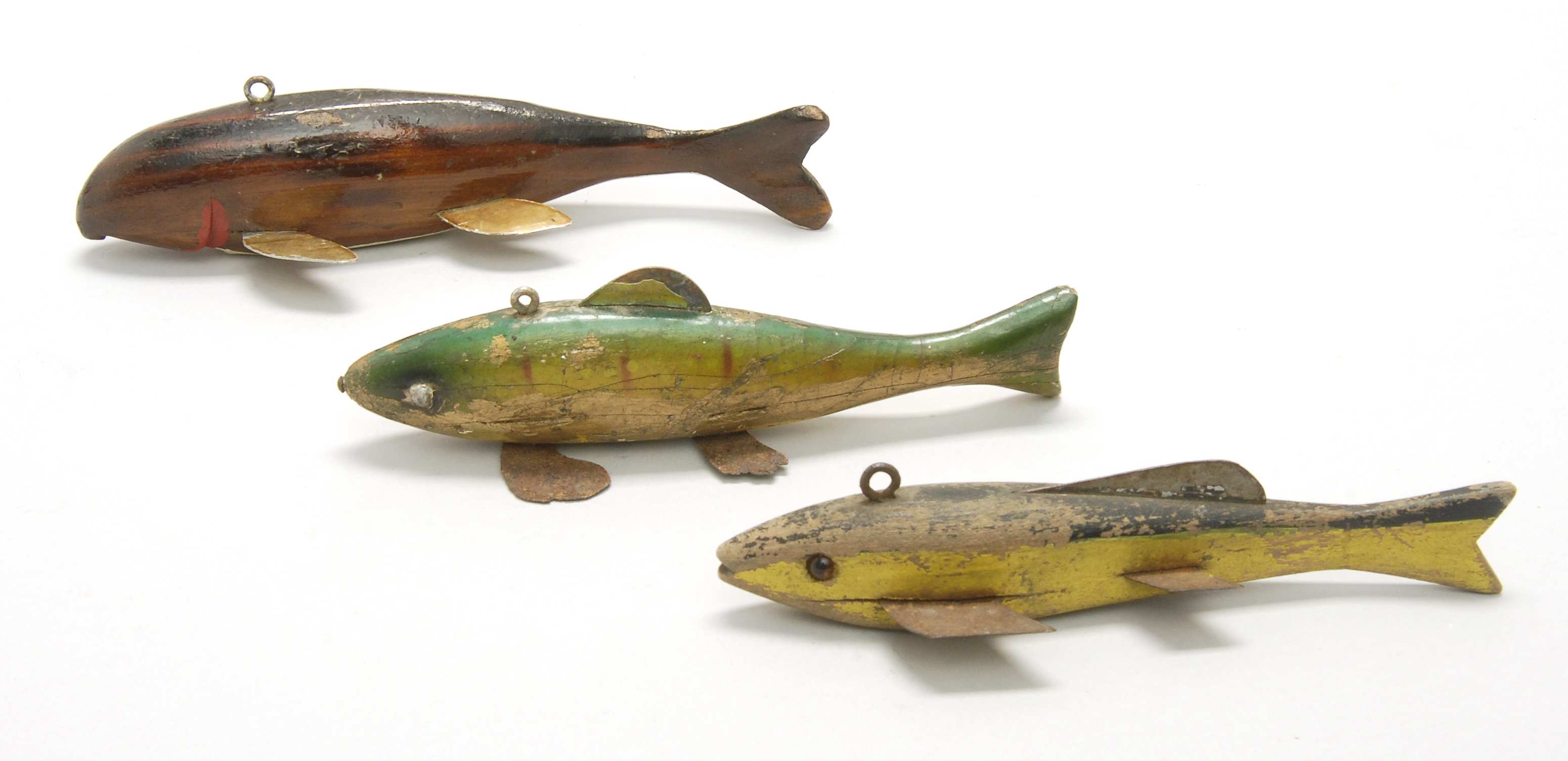 Appraisal: THREE FISH DECOYS th CenturyOne with tack eyes one with