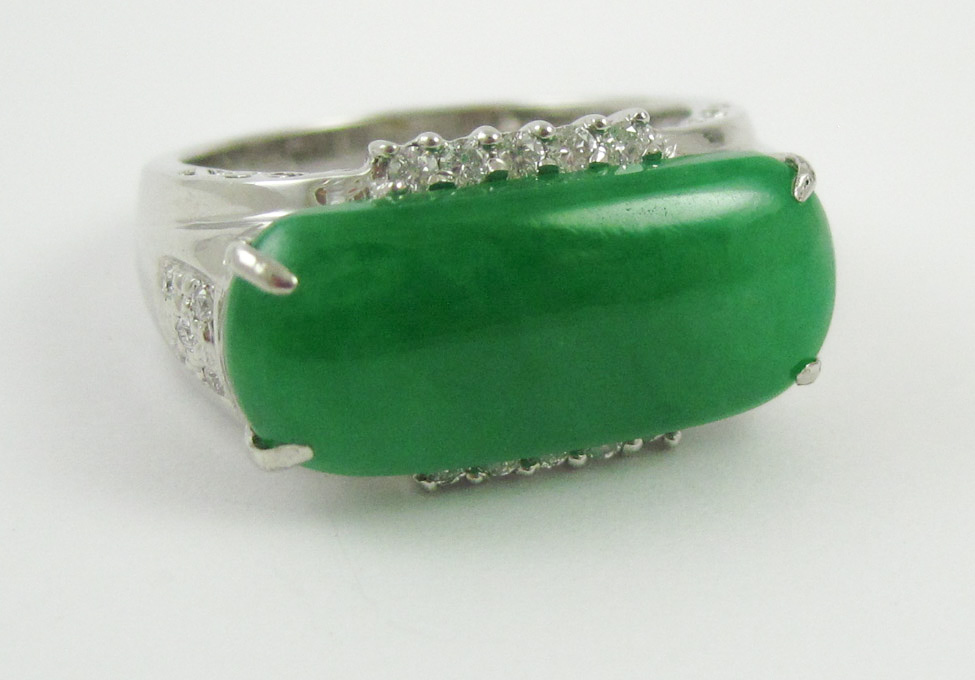 Appraisal: EIGHTEEN KARAT WHITE GOLD DIAMOND AND JADE RING having green