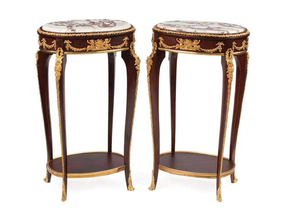 Appraisal: Pair of Louis XV-Style Bronze-Mounted Gueridons inset variegated marble tops