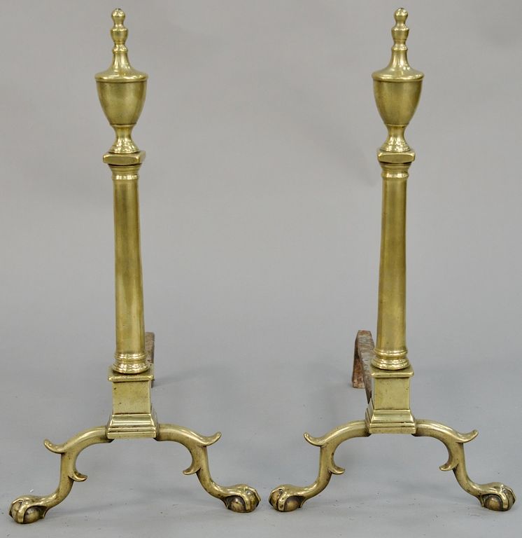 Appraisal: Pair of Chippendale brass andirons with urn tops and turned