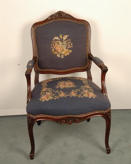 Appraisal: An Open Arm Chair having a molded mahogany frame and