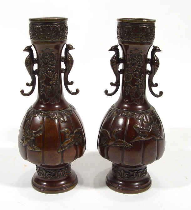 Appraisal: Pair of oriental bronze vases with bird handles and cast