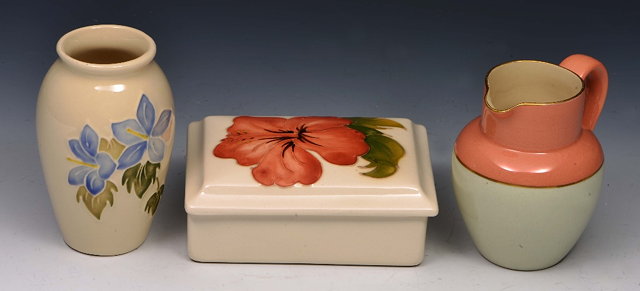 Appraisal: Moorcroft box and cover and small vaseeach decorated with flowers