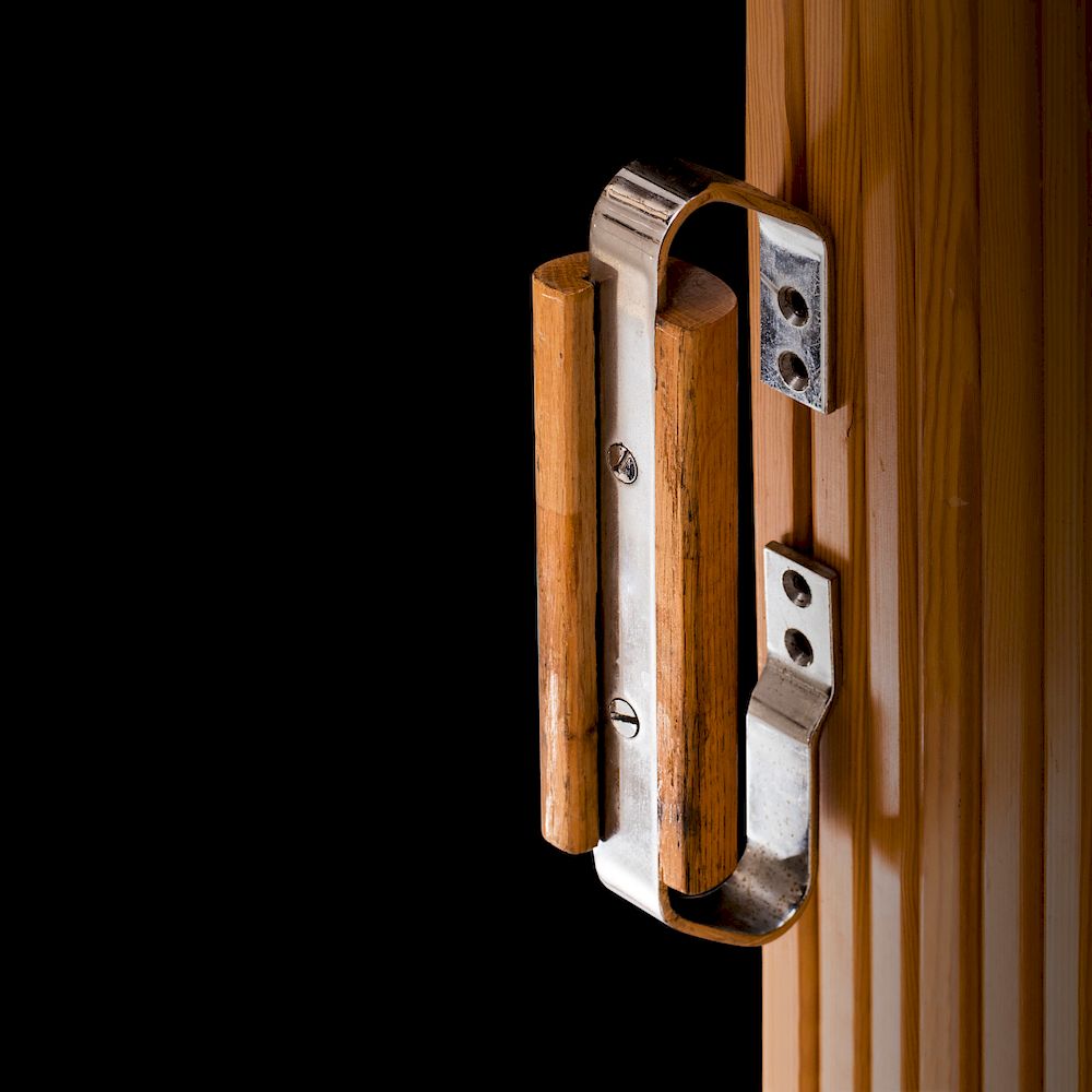 Appraisal: Alvar Aalto A pair of doorhandles designed by Alvar Aalto