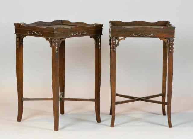 Appraisal: Pr Carved Mahogany Occasional TableEach with shaped gallery and applied