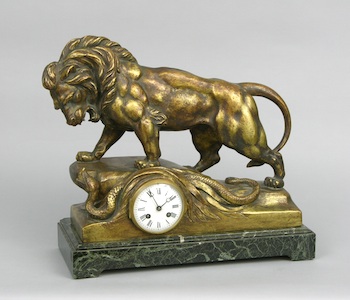 Appraisal: A French Figural Clock ca Patinated metal figure of lion