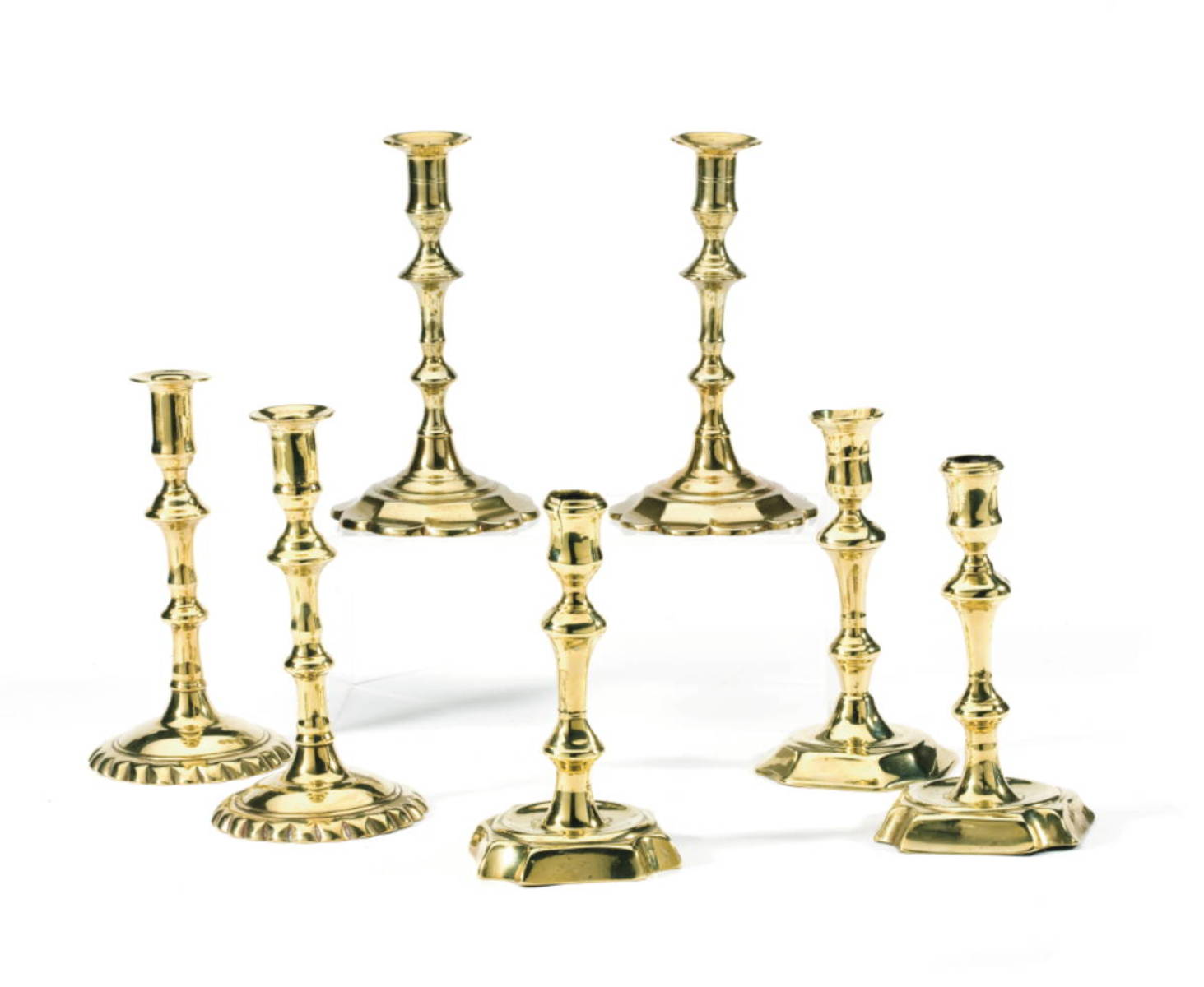 Appraisal: SEVEN ENGLISH BRASS CANDLESTICKS COMPRISING THREE PAIR AND A SINGLE