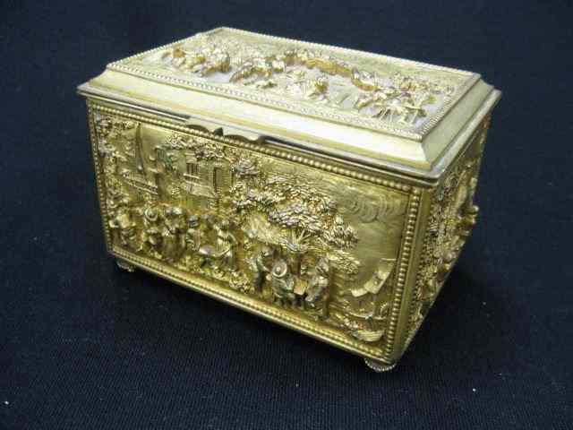 Appraisal: French Bronze Dresser Box elaboratevillage scenes in bas-relief footed silk