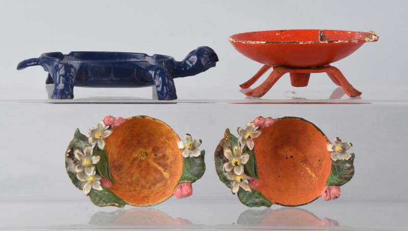 Appraisal: Cast Iron Soap Dishes Orange Nut Dishes Includes Turtle and