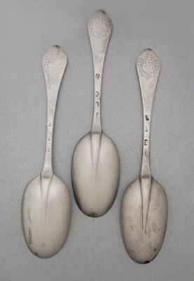 Appraisal: Three tablespoons with plain moulded rattails and matching engraved coat