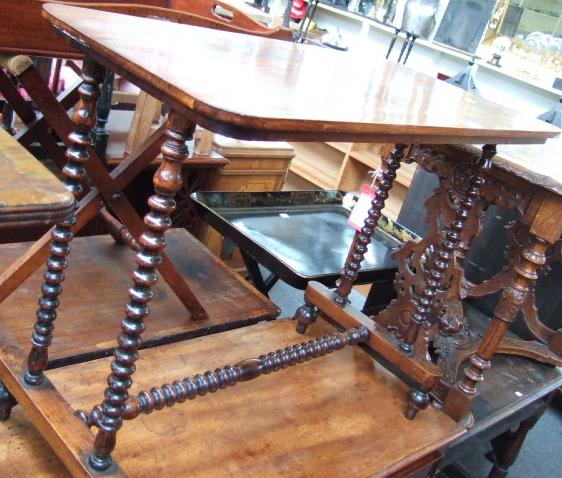 Appraisal: A Victorian walnut occasional table the rectangular top on bobbin