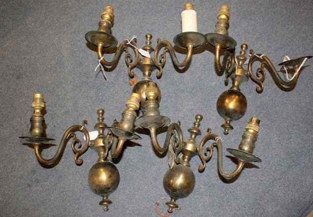 Appraisal: A SET OF FOUR DUTCH STYLE TWO BRANCH BRASS WALL