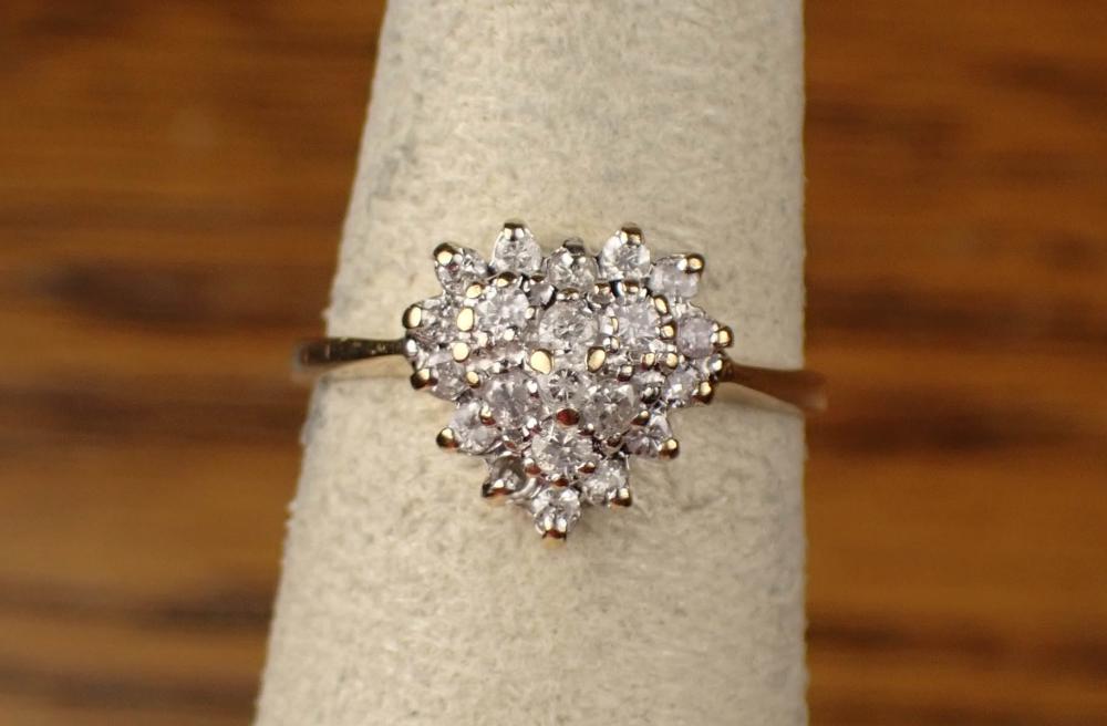 Appraisal: DIAMOND HEART CLUSTER RING K yellow gold round-cut diamonds with