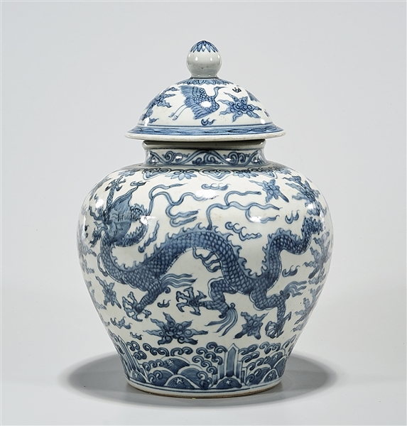 Appraisal: Chinese blue and white porcelain covered vase depicting dragons chasing