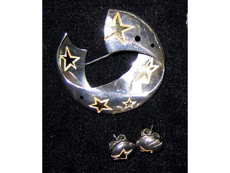 Appraisal: MICHAEL BONDANZA BROOCH AND EARRING SET Sterling silver swirling ribbon