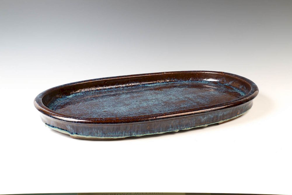 Appraisal: LARGE YIXING FLAMBE TRAY JIAQING MARK Of shallow oval form