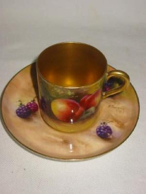 Appraisal: A ROYAL WORCESTER PORCELAIN COFFEE CAN AND SAUCER the can