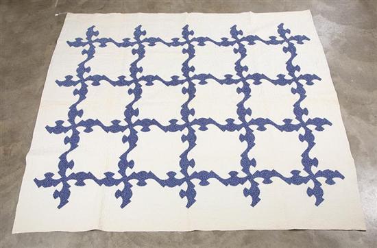 Appraisal: BLUE AND WHITE QUILT in Drunkard's Path pattern Hand pieced