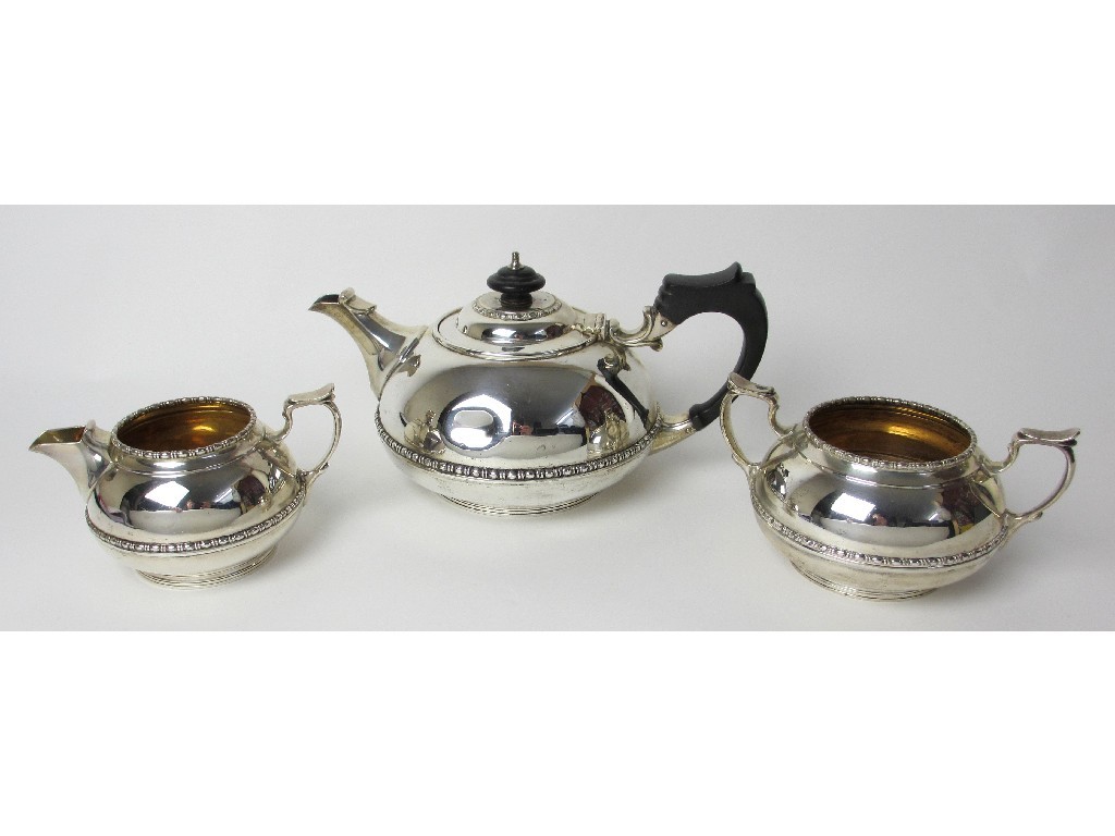 Appraisal: A three piece silver tea service of squat spherical form