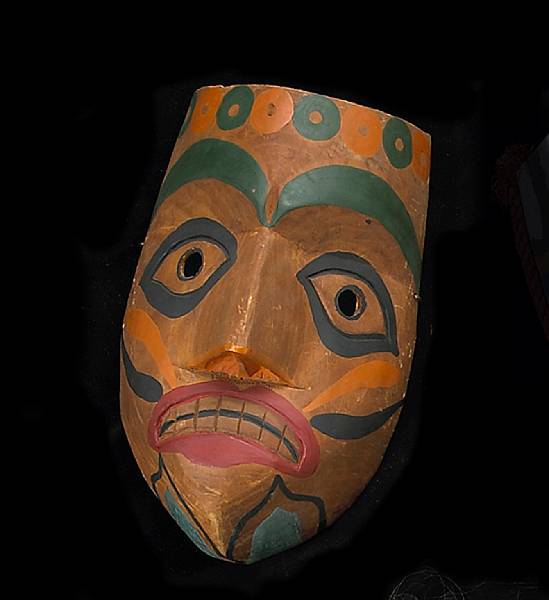 Appraisal: A Nootka mask With carved and painted details the eyes