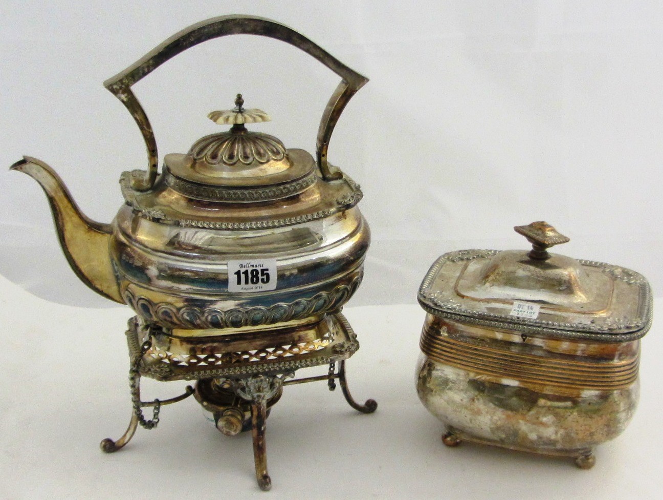 Appraisal: A plated spirit kettle with a stand and a spirit