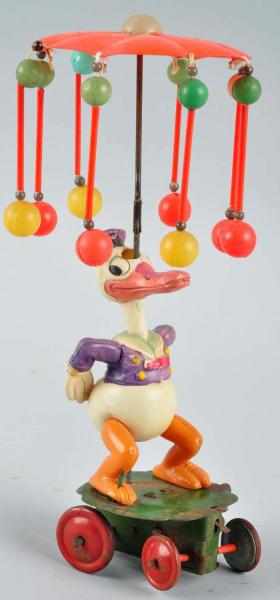 Appraisal: Celluloid Disney Donald Duck Carousel Wind-Up Toy Description Japanese Circa