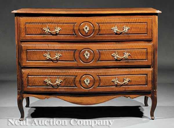 Appraisal: A French Provincial Carved Walnut Commode early th c molded