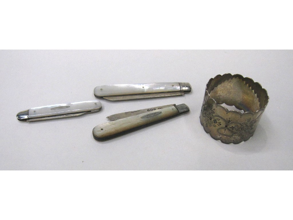 Appraisal: Lot comprising three silver and mother of pearl fruit knives