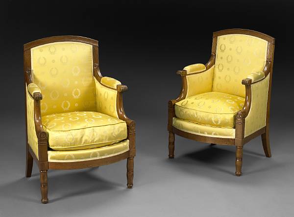 Appraisal: A pair of Empire walnut upholstered berg res Jacob Desmalter