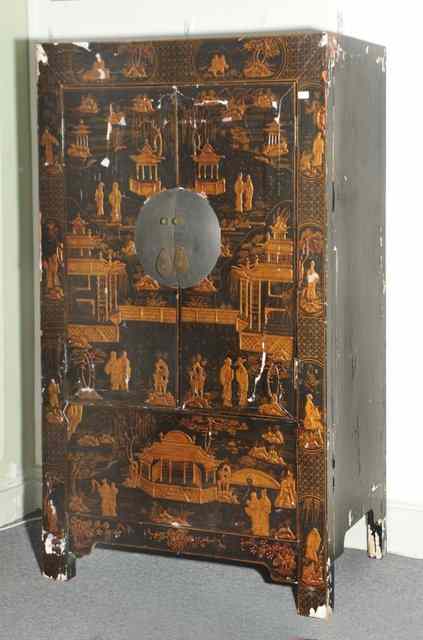 Appraisal: A CHINESE EXPORT LARGE CABINET with black and gilded lacquer