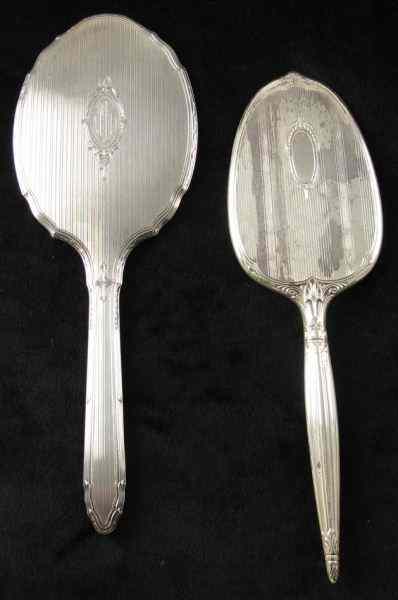 Appraisal: Two Sterling Hand Mirrorsthe first by Gorham engraved designs monogram