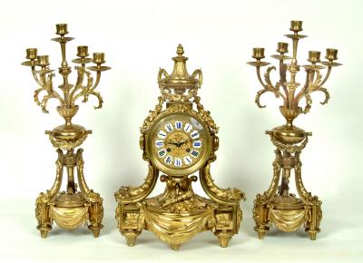 Appraisal: A FRENCH GILT BRONZE GARNITURE the eight day movement striking