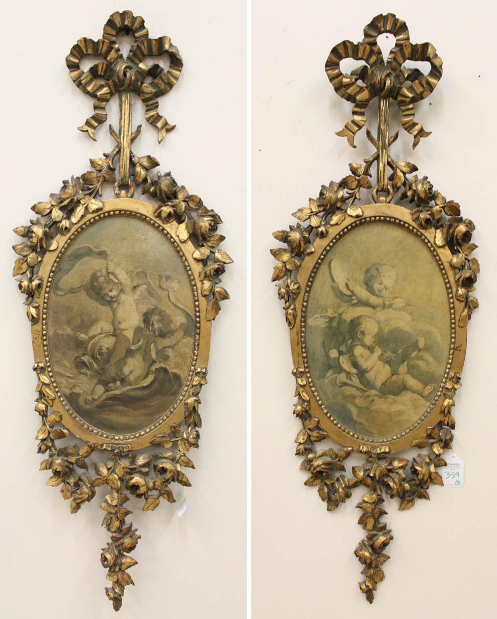 Appraisal: TWO PAINTINGS OF CHERUBS OILS ON BOARD in ornate gilt