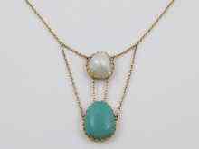 Appraisal: A yellow metal tests ct gold baroque pearl and turquoise