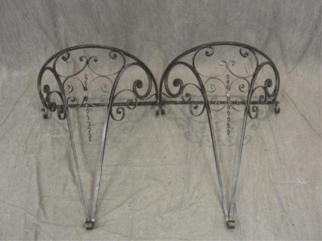 Appraisal: Pair of Iron and Marbletop Demilune Consoles From an East