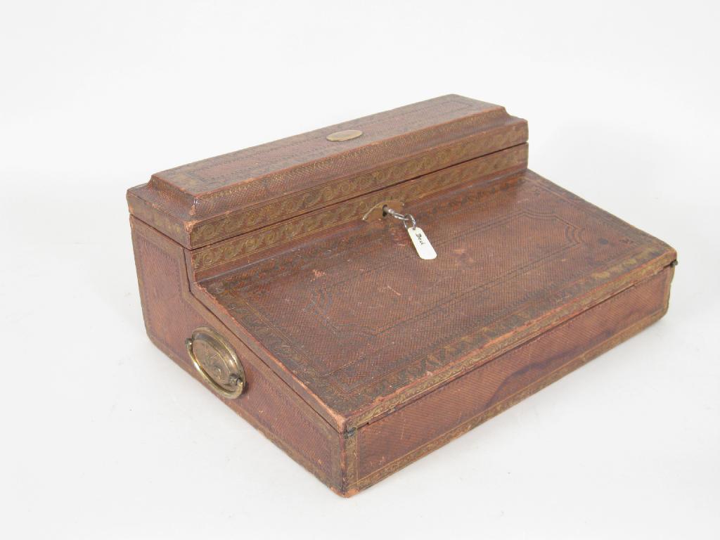 Appraisal: An early th Century tooled leather Lap Desk with satinwood