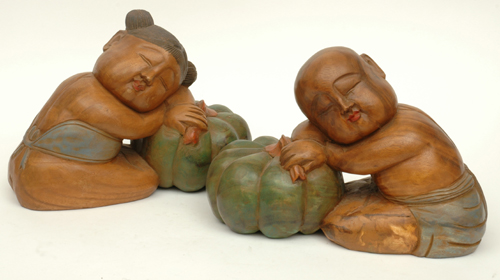 Appraisal: A PAIR OF ORIENTAL POLYCHROME FIGURES OF CHILDREN