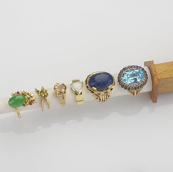 Appraisal: SIX GEM-SET GOLD RINGS k and k Include opal sapphire