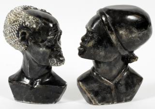 Appraisal: AFRICAN BLACK STONE CARVED BUSTS MAN AND WOMAN AFRICAN BLACK