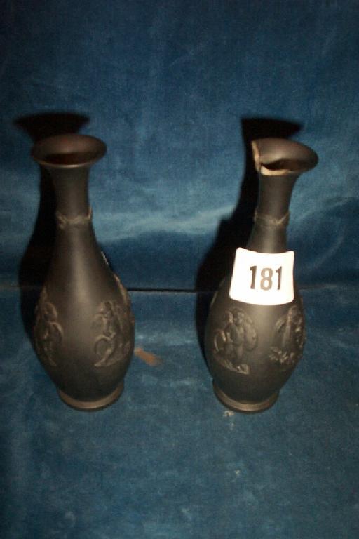 Appraisal: A pair of th century Wedgwood black basalt vases of